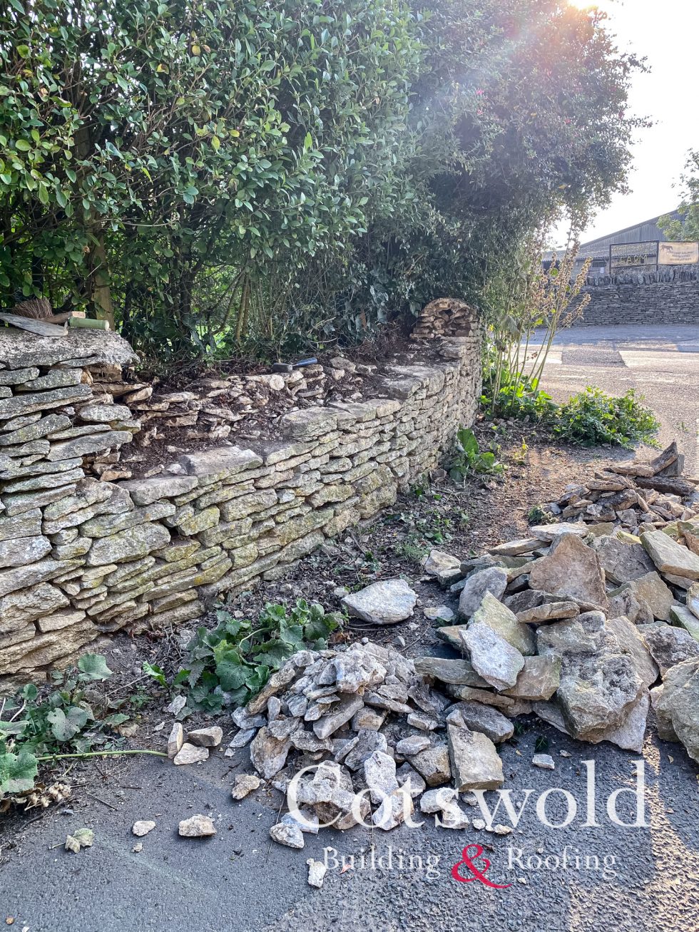 Cotswold stone wall repair by Cotswold Building and Roofing Ltd