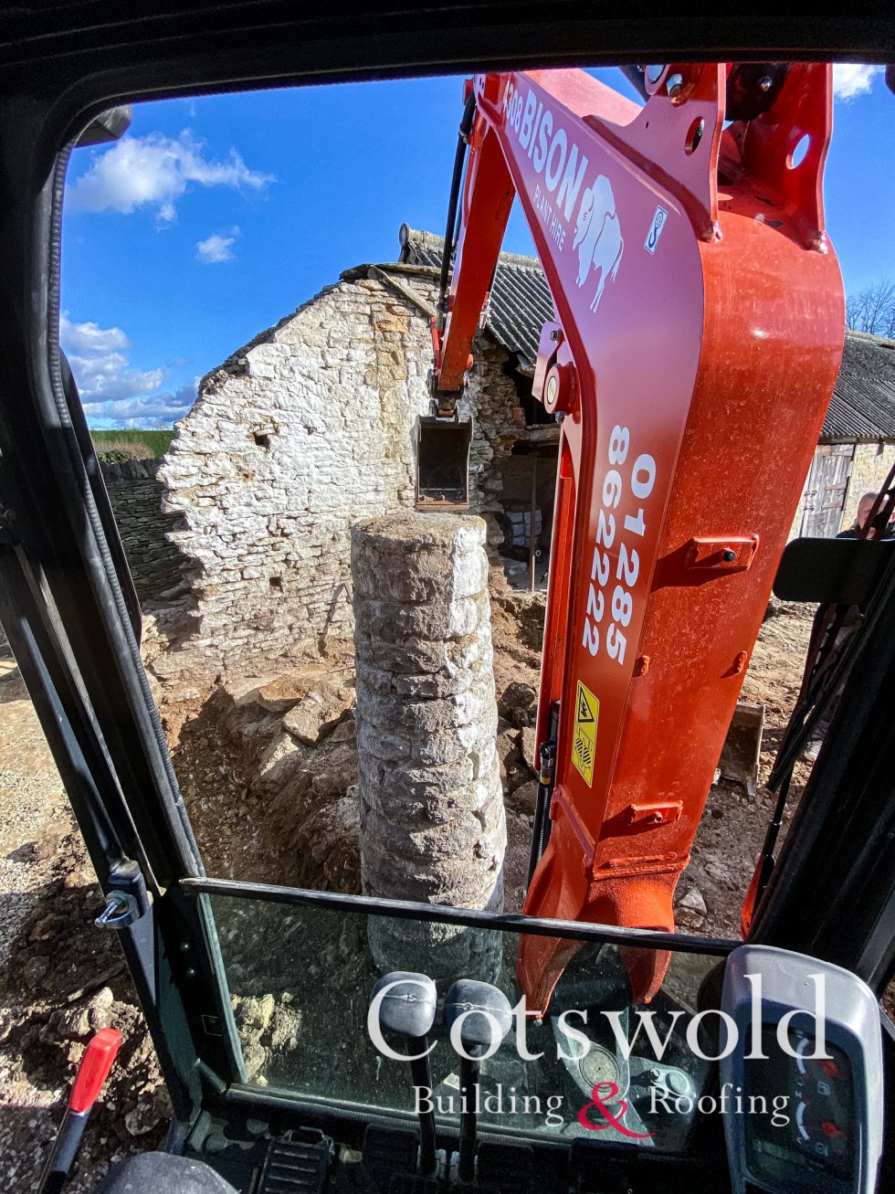 Digger digging out foundations and groundworks by Cotswold Building and Roofing Ltd
